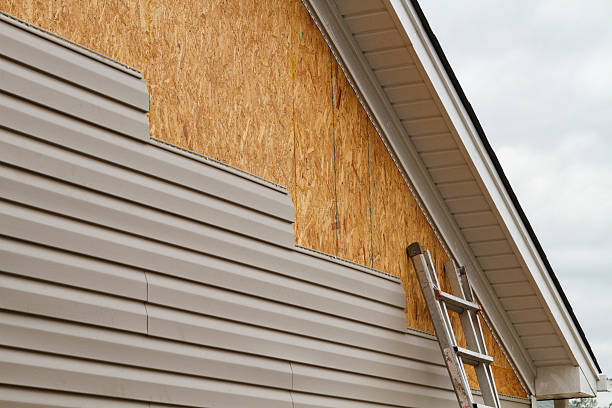 Professional Vinyl Siding technician working in Henderson, NC